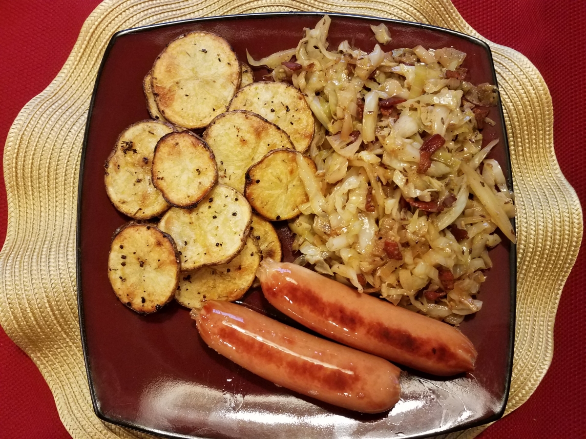 Knackwurst Roasted Rosemary Garlic Potato Slices And Braised Bacon Caraway Cabbage Cooking 4 One 